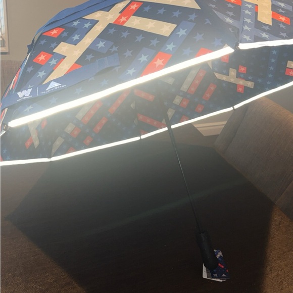 New Folds of honor umbrella.Designed by a weatherman Download app to get alerts. - Picture 7 of 10